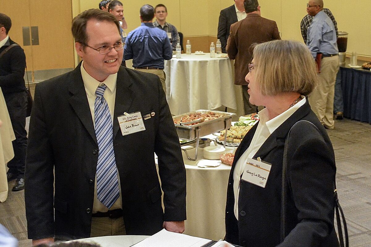 Veterans networking at job fair for military-to-civilian employment