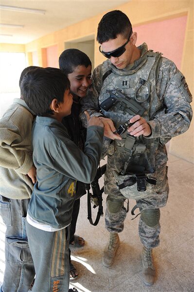 U.S. Army soldiers with Iraqi children during deployment