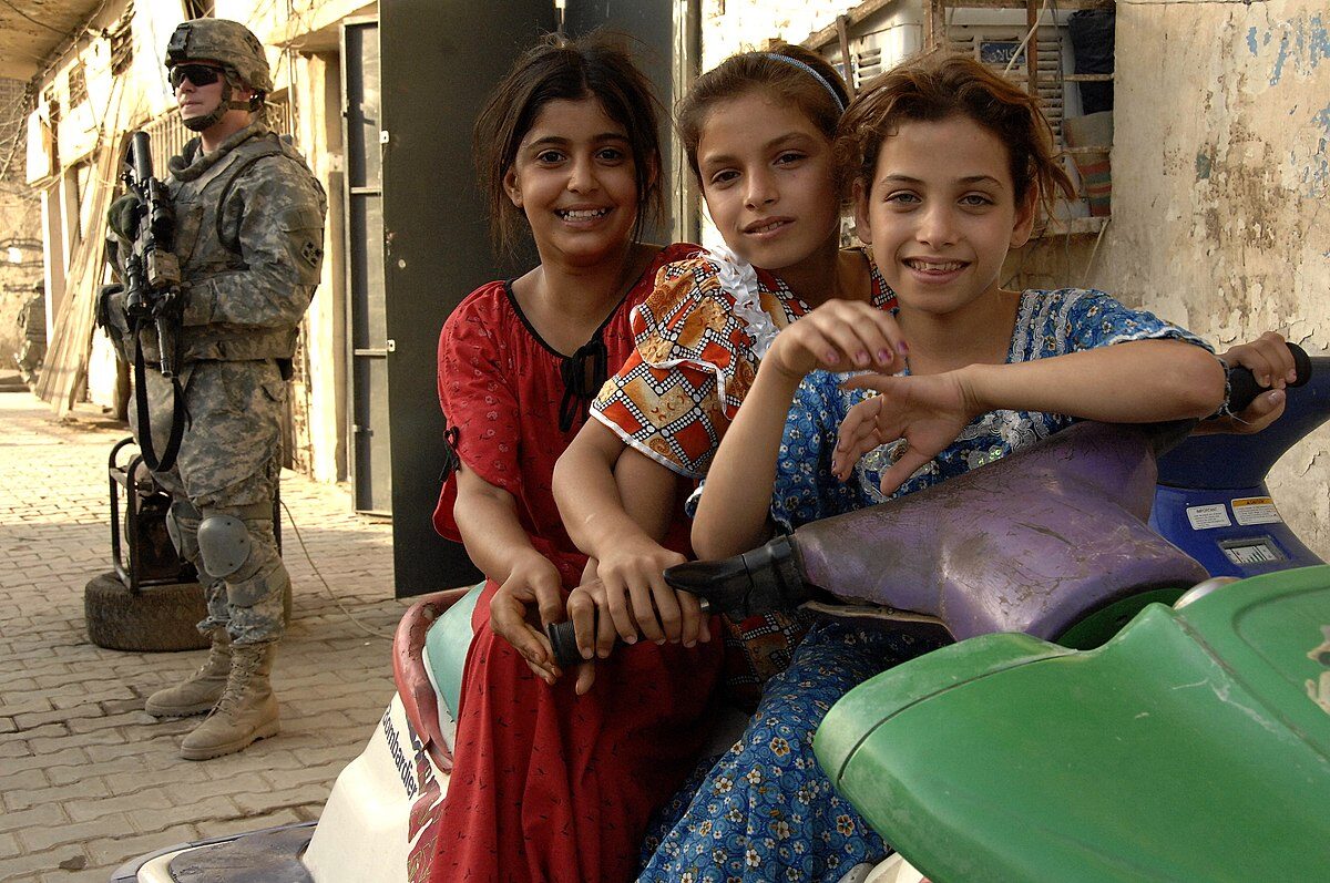 U.S. and Iraqi soldiers on patrol in Baghdad neighborhood