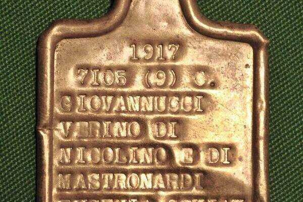 Military dog tags representing military service identification