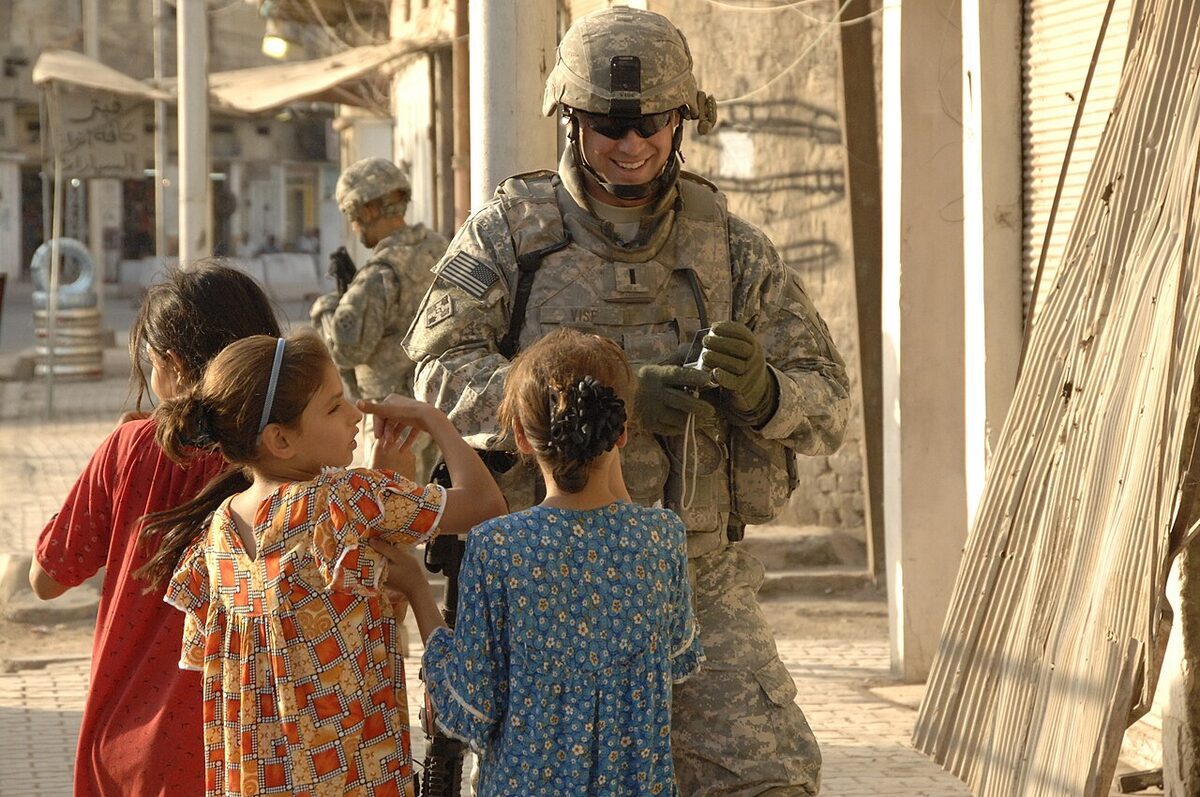 U.S. and Iraqi soldiers patrolling a Baghdad neighborhood